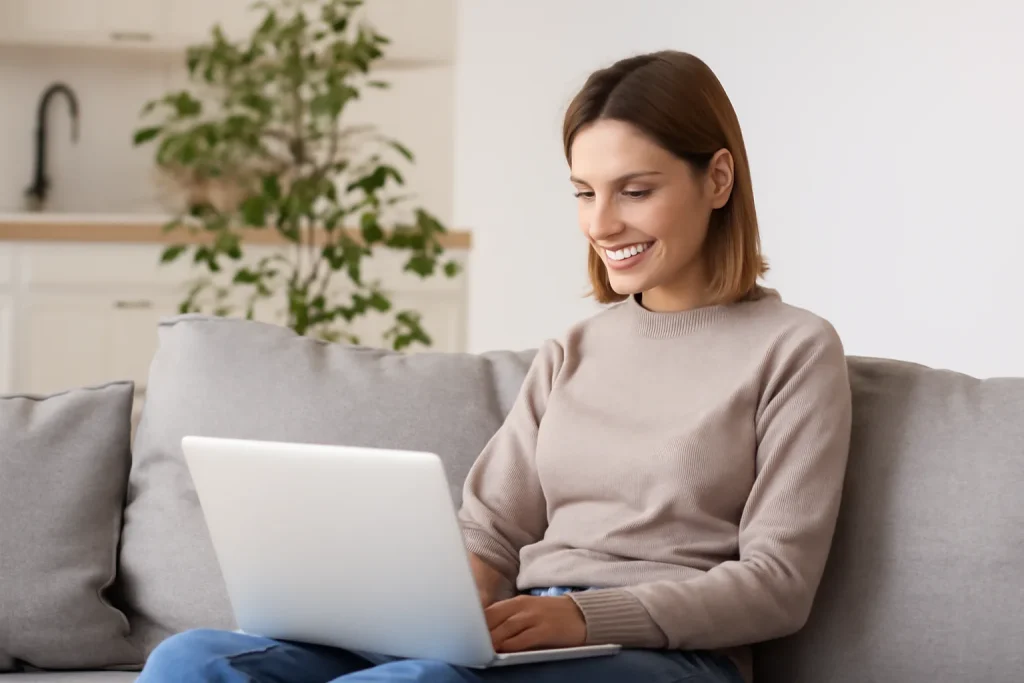 woman enjoying benefits of online typing jobs while working from home